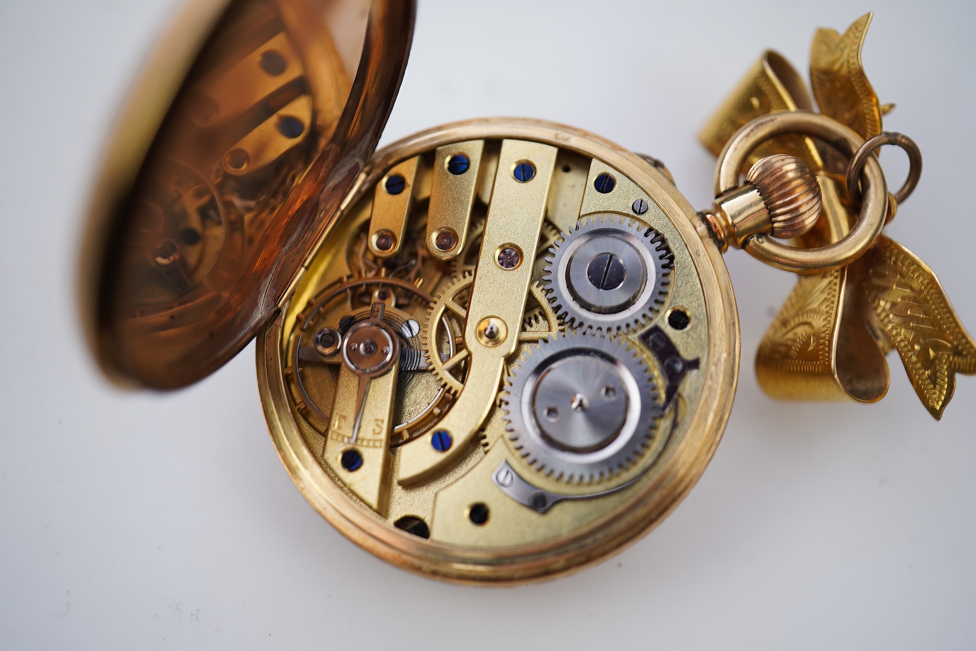 A gold fob watch, early 20th century and later